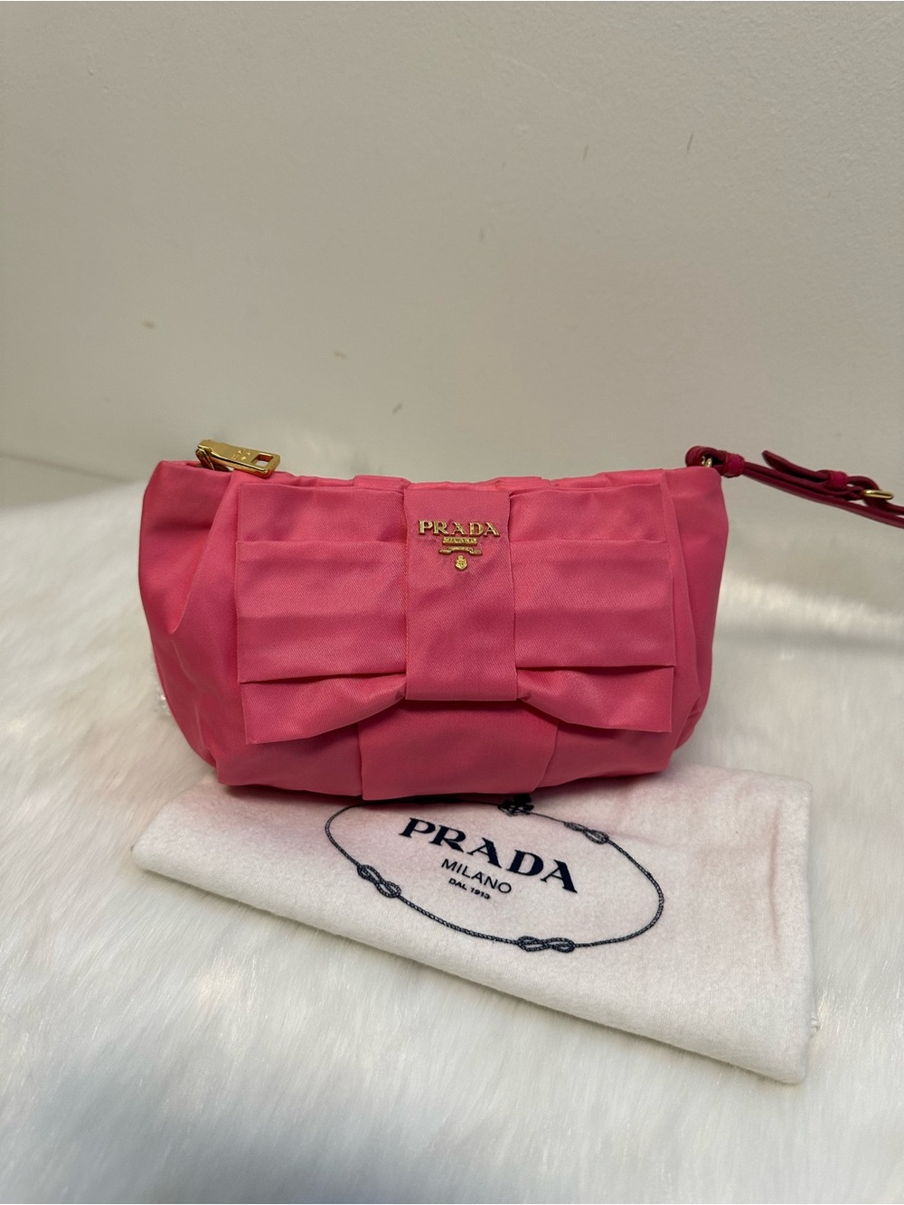 Prada Pink Bow Wristlet with Gold Hardware